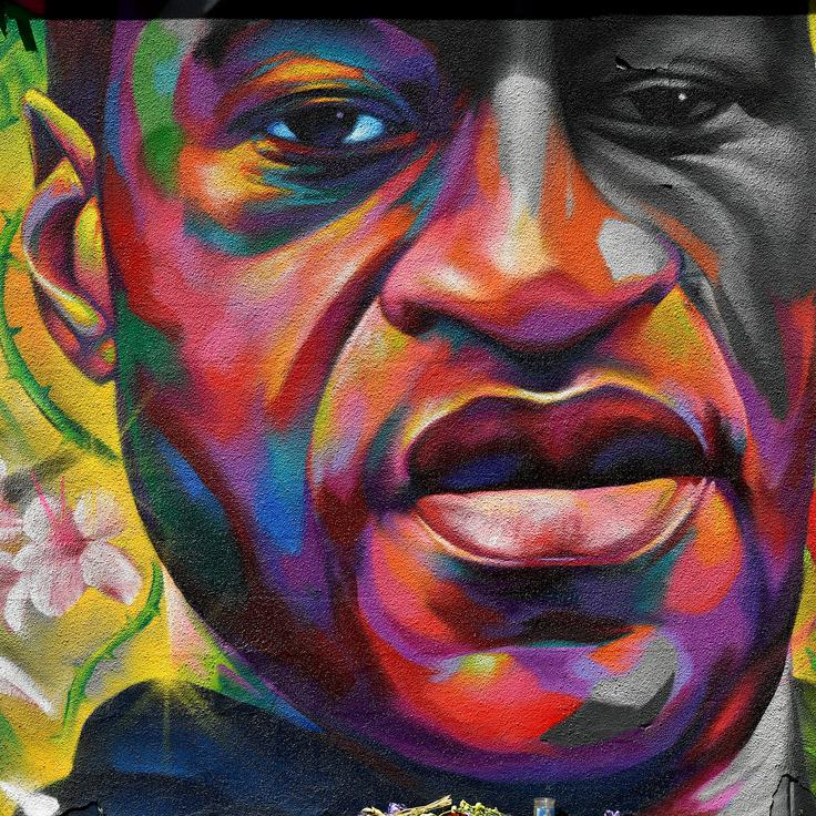 A mural of George Floyd is seen on a wall along Colfax Avenue on June 7, 2020, in Denver. Floyd's killer, former police officer Derek Chauvin, was found guilty of murder on Tuesday.