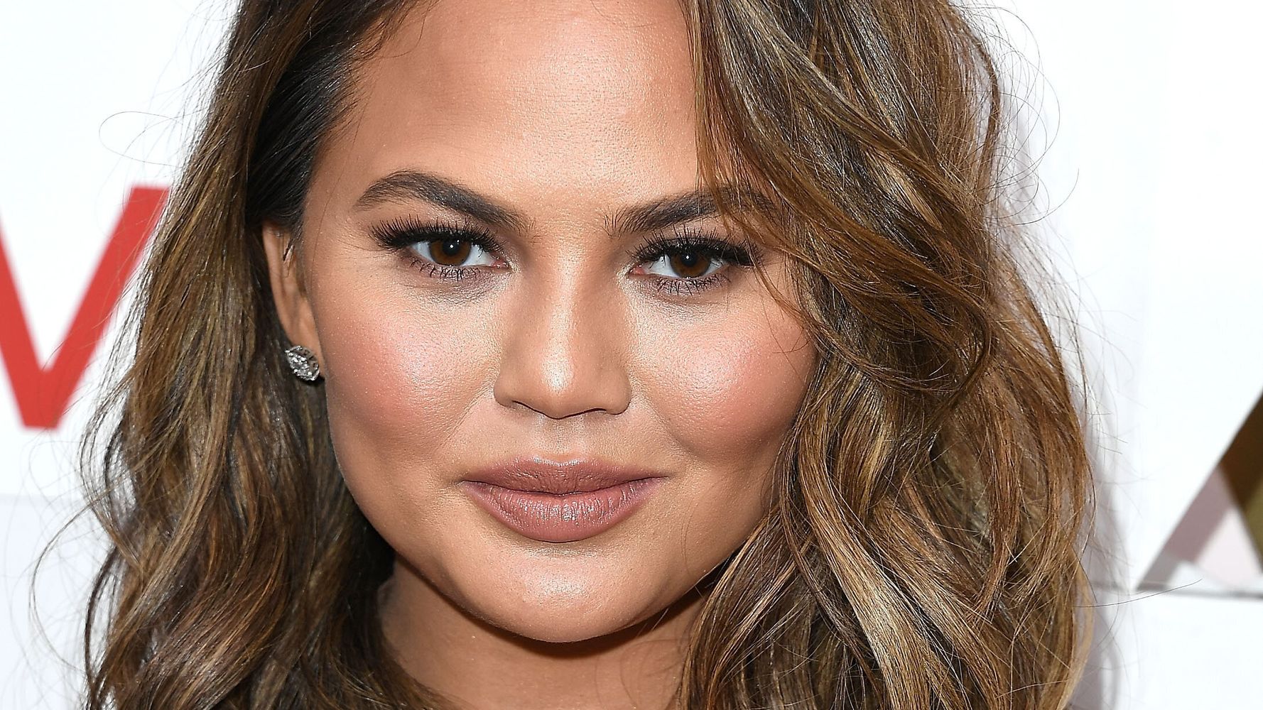 Chrissy Teigen Reveals How She And Meghan Markle Connected Over 'Loss'