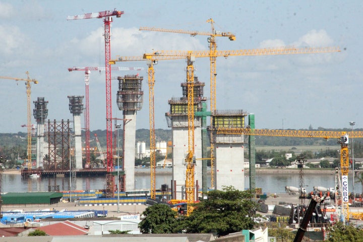 Cranes constructing the Katembe suspension bridge in gas-rich Mozambique's capital Maputo.&nbsp;