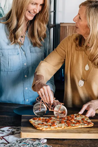 Sadly, most pizza cutters use the same dull design: a sharp wheel and a handle. Wouldn't life be better if you <a href="https