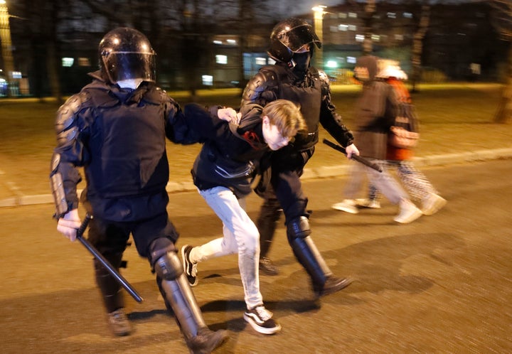 Police detain a man during a protest in support of jailed opposition leader Alexei Navalny in St. Petersburg, Russia, Wednesd