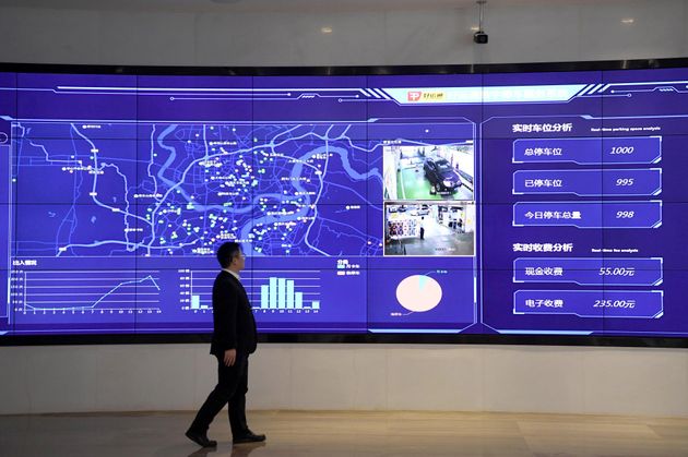 重慶市で運用される駐車場の使用状況を収集するシステム  (Photo by Chen Chao/China News Service via Getty Images)