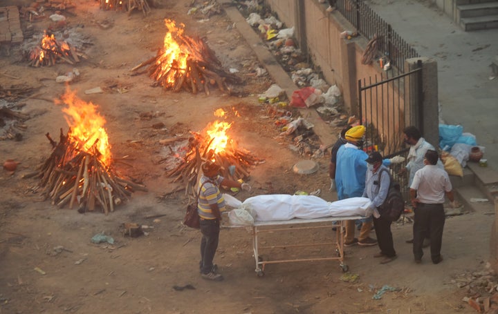 NEW DELHI, INDIA - APRIl 23: COVID-19 victims being cremated at Seemapuri crematorium, on April 23, 2021 in New Delhi, India. (Photo by Amal KS/Hindustan Times via Getty Images)