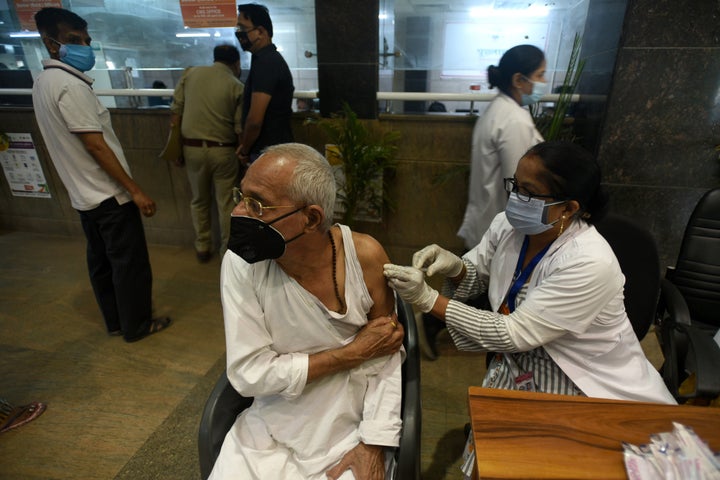 NOIDA, INDIA - APRIL 24: An elderly man gets vaccinated against Covid-19, at a district hospital at sector 30, on April 24, 2021 in Noida, India. (Photo by Sunil Ghosh/Hindustan Times via Getty Images)