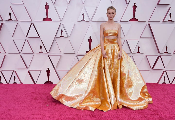 Carey Mulligan fittingly dressed in gold for the Oscars