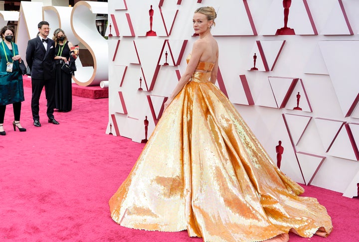 The "Promising Young Woman" actor wore a sparkly golden crop top and skirt by Valentino.