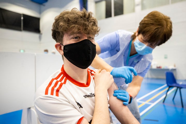 Eoin McCullagh receiving a vaccine.
