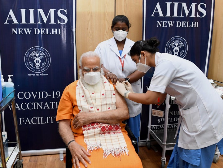 Indian Prime Minister Narendra Modi receives the second dose of the Covaxin coronavirus vaccine April 8 at a hospital in New Delhi. Modi spoke with the Biden Monday about receiving raw material for AstraZeneca vaccines.