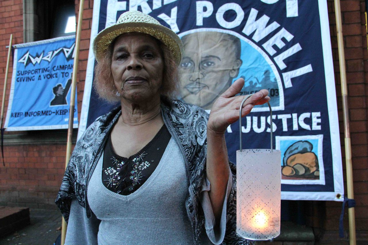 Mikey's mother Clarissa Powell at a vigil for her son