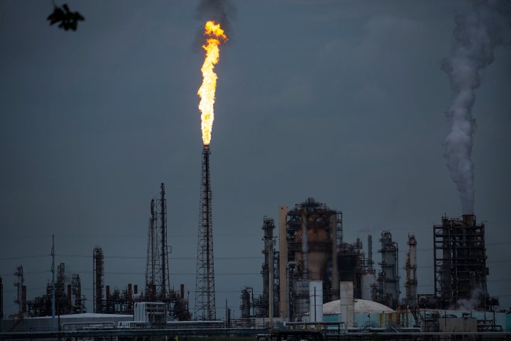 A gas flare from the Shell Chemical LP petroleum refinery illuminates the sky on Aug. 21, 2019, in Norco, Louisiana.&nbsp;