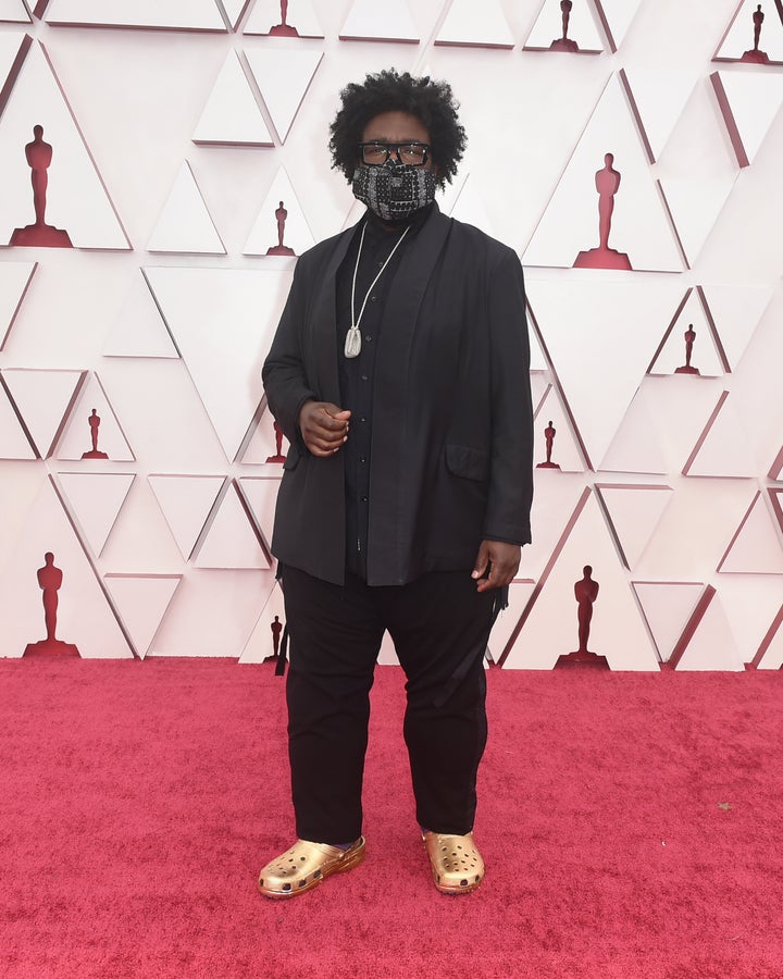 Questlove in his golden Crocs