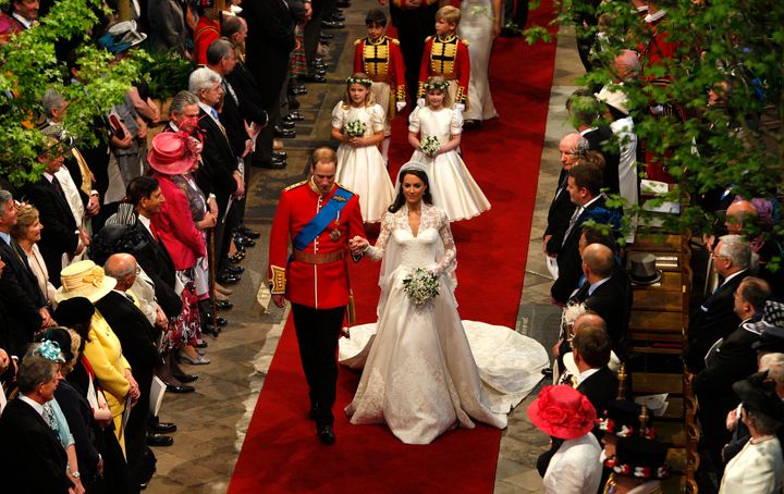 The Duke and Duchess of Cambridge walk down the aisle at the close of their wedding ceremony at Westminster Abbey.