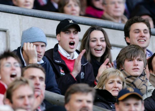 Kate spends time with William and his brother, Prince Harry, while cheering on England at a February 2007 rugby championship 