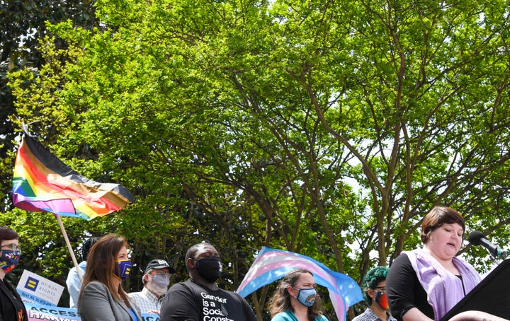 Trace Trice, the parent of a transgender child, speaks March 30 at a rally at the Alabama State House to draw attention to anti-transgender state legislation.