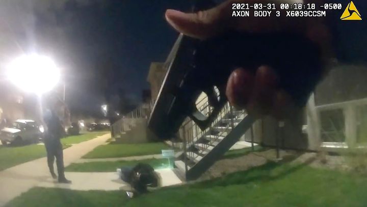 In this image taken from Chicago Police body cam video from early Wednesday, March 31, 2021, Anthony Alvarez lies on the ground after a police foot chase in Chicago. Alvarez was fatally shot by police during the incident. Police claim Alvarez, 22, brandished a gun while being chased. (Civilian Office of Police Accountability via AP)