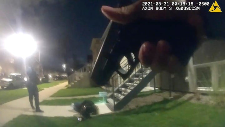 In this image taken from Chicago Police body cam video from early Wednesday, March 31, 2021, Anthony Alvarez lies on the grou