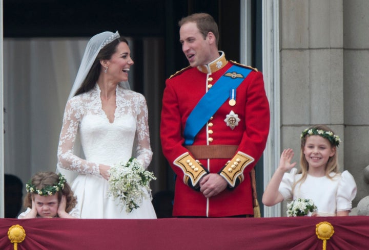 The newlyweds sharing a moment on the balcony of Buckingham Palace following their wedding at Westminster Abbey on April 29, 2011, in London.