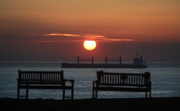 The sun rises over the North East coast at Tynemouth. 