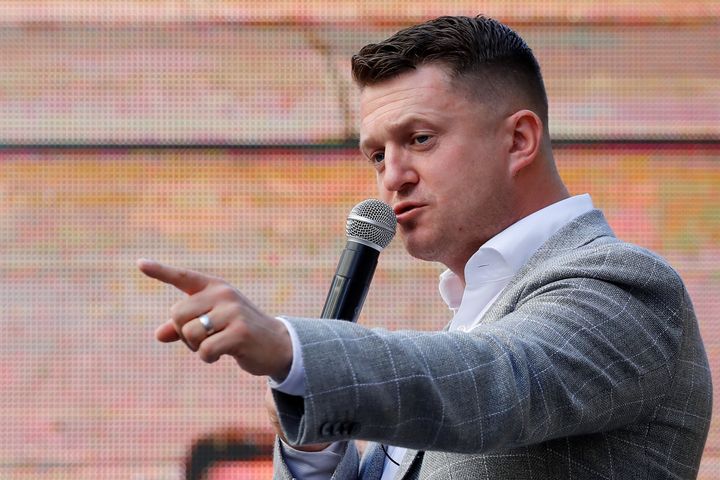 Founder and former leader of the anti-Islam English Defence League (EDL), Stephen Yaxley-Lennon, aka Tommy Robinson, addresses supporters outside the Old Bailey, London's Central Criminal Court, in central London on July 4, 2019