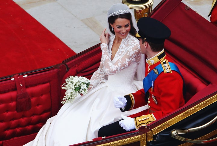 Prince William and the Duchess of Cambridge prepare to begin their journey by carriage procession to Buckingham Palace following their marriage at Westminster Abbey.