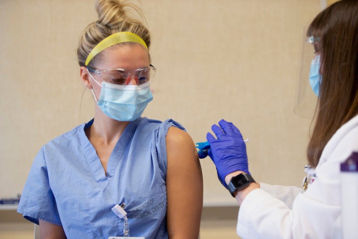 A nurse at Maine Medical Center receiving a vaccination earlier this year. Nurses at the facility voted decisively to unioniz