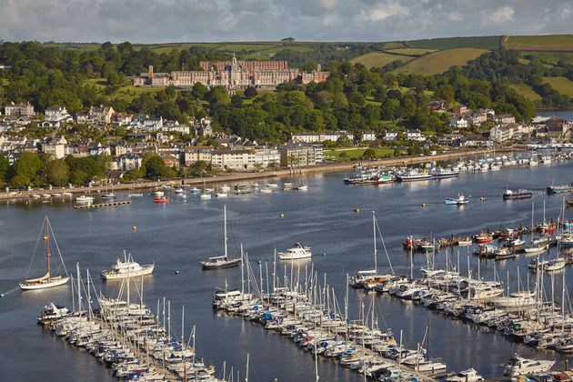 A view along the River Dart from Kingswear, looking across to the historic town of Dartmouth, Devon