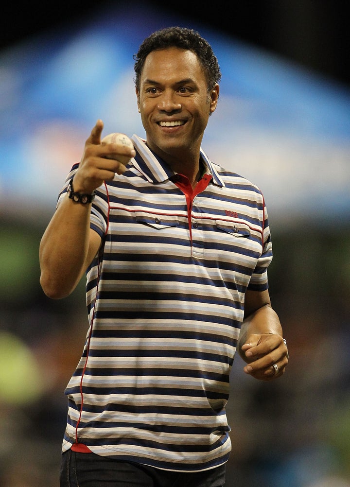 SAN JUAN, PUERTO RICO - JUNE 30: Roberto Alomar Jr. throws out the first pitch before the game between the New York Mets and