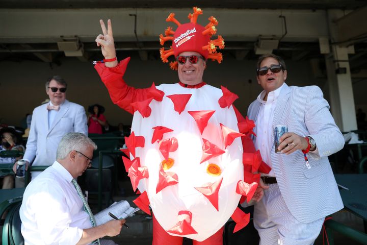 Kentucky Derby spectator Mark Ferguson of Dallas, Texas, wearing a COVID-19 costume at Saturday's event.