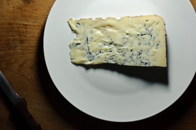 Slice of Gorgonzola cheese