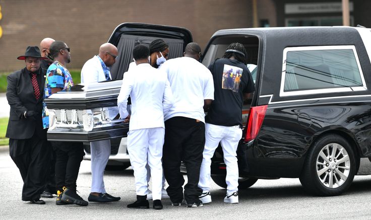 The family members of Andrew Brown Jr., Al Sharpton and others take part in his funeral on May 3.