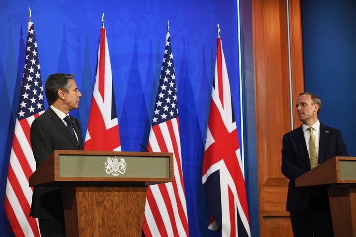 In this May 3, 2021, photo, Britain's Foreign Secretary Dominic Raab, right, and U.S. Secretary of State Antony Blinken speak