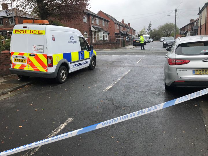 A police cordon in place at Walker Avenue in Bolton where a 15-year-old boy was stabbed several times.