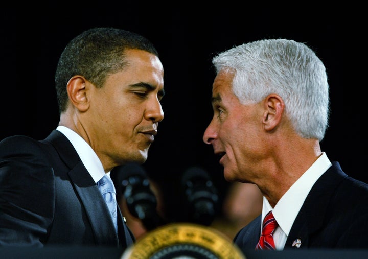 Then-Republican Gov. Charlie Crist introduces then-President Barack Obama during a town hall meeting on Feb. 10, 2009, in For