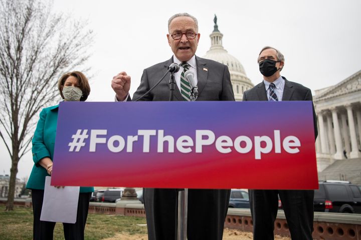 Senate Majority Leader Chuck Schumer (D-N.Y.) and Sens. Amy Klobuchar, (D-Minn.) and Jeff Merkley (D-Ore.) introduce the Senate version of the For The People Act on March 17.