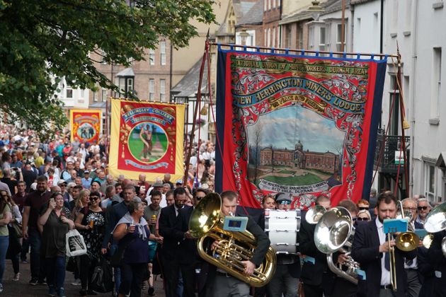 Pipe bands and banners parade through Durham during the Durham Miners' Gala
