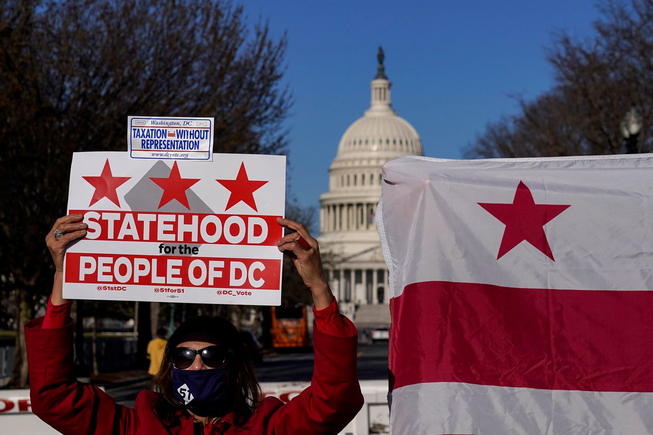 D.C. residents rallied this year for the passage of H.R. 51, the statehood bill that the House approved in April. The bill faces longer odds in the Senate, thanks to Republican opposition, the filibuster and a lack of support from at least one Democratic holdout — Sen. Joe Manchin of West Virginia.