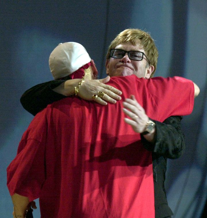 Sir Elton John and Eminem on stage at the Brits