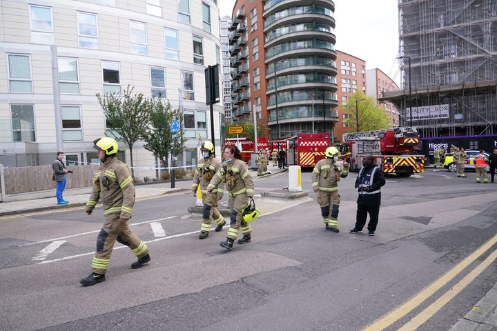 <strong>Firefighters at the scene in New Providence Wharf in London.</strong>
