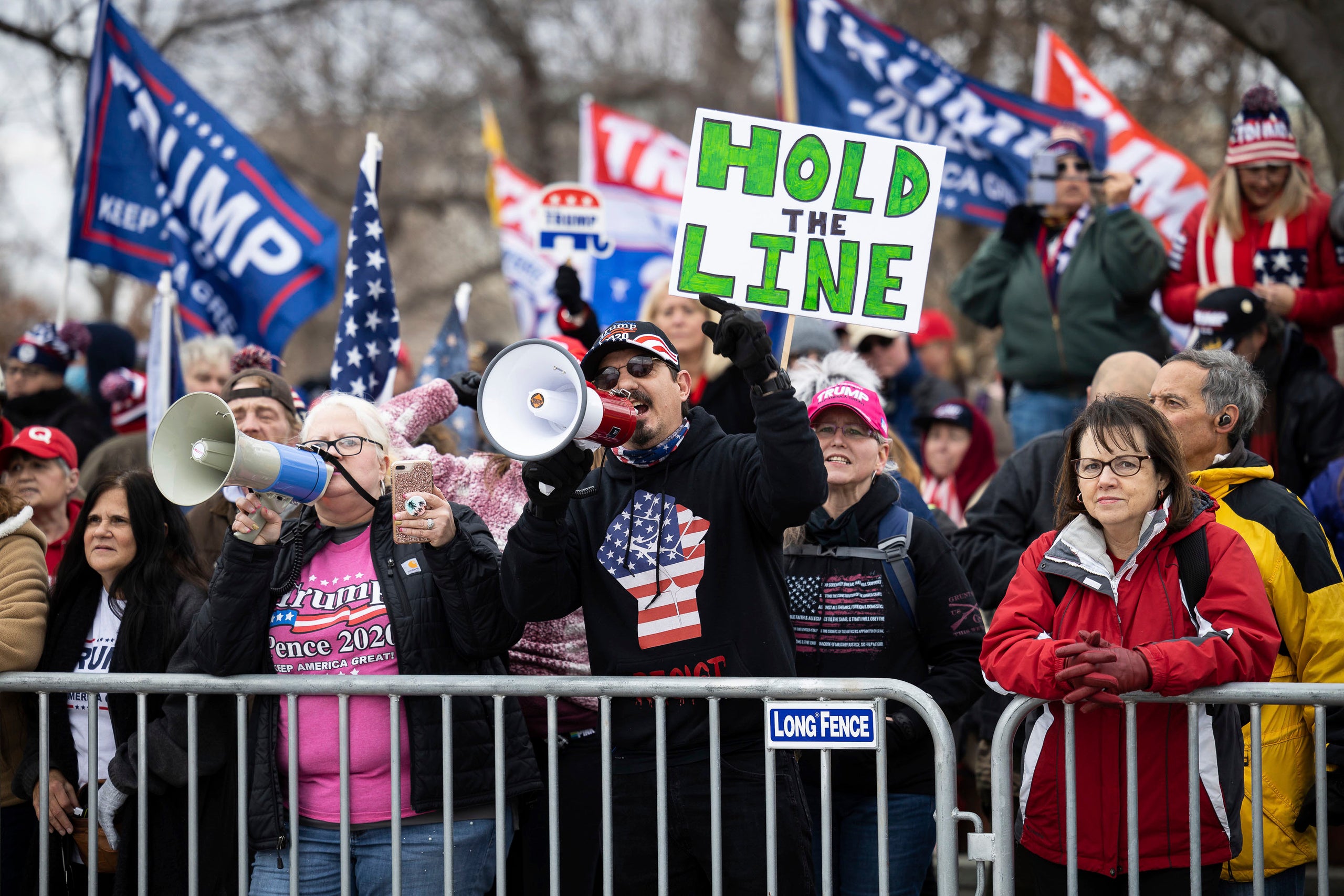 Supporters of President Donald Trump gather behind a police barricade on the east plaza of the U.S. Capitol onJan. 6 to prote