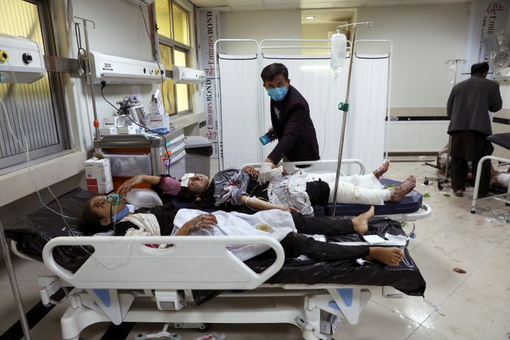 Afghan school students are treated at a hospital after a bomb explosion near a school in west of Kabul, Afghanistan, Saturday, May 8, 2021. (AP Photo/Rahmat Gul)