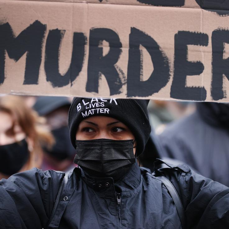 Demonstrators protest near the Hennepin County Courthouse in Minneapolis on April 19, 2021, as the jury deliberated in the trial of former police officer Derek Chauvin. The jury eventually convicted Chauvin of murdering George Floyd.
