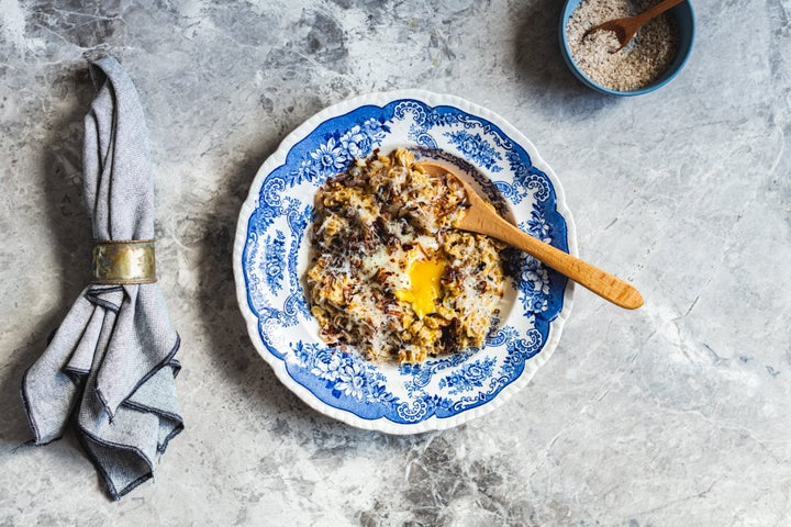 Savory oats, like the ones seen here with eggs, can help prevent sugar crashes later in the day.