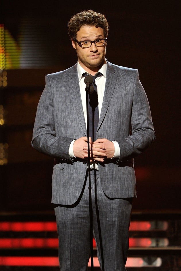 Seth said he had to cover a stain on his suit when he presented an award