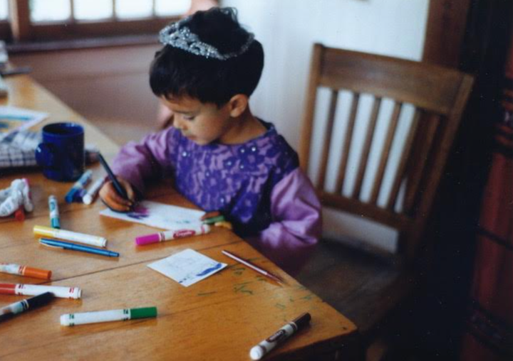 The author's child, Danny Moreno, in 1993. Danny loved to dress up as a princess and loved to draw.