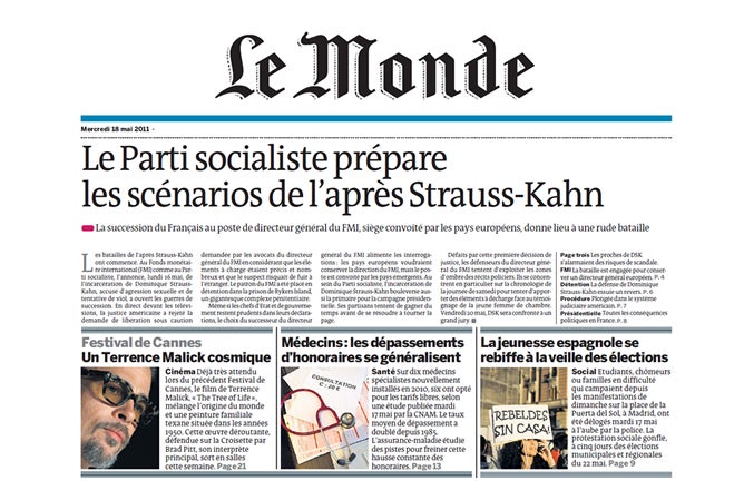 Portada del diario francés 'Le Monde' con una pancarta de un indignado