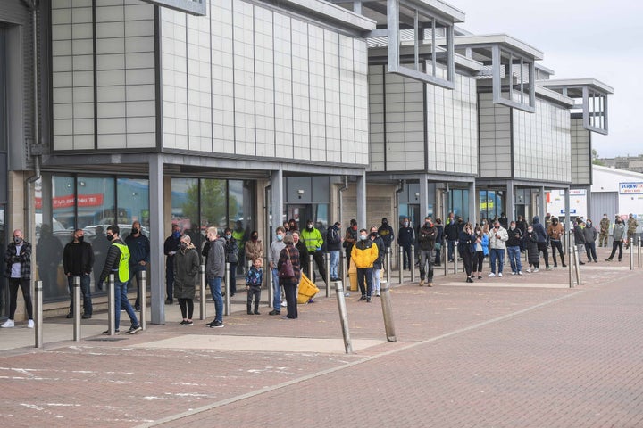 Large queues outside a vaccine centre Elgin, Moray, Scotland. 