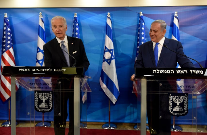 Then-Vice President Joe Biden, left, appears alongside Israeli Prime Minister Benjamin Netanyahu in March 2016. As president, Biden has remained staunchly defensive of Israel.