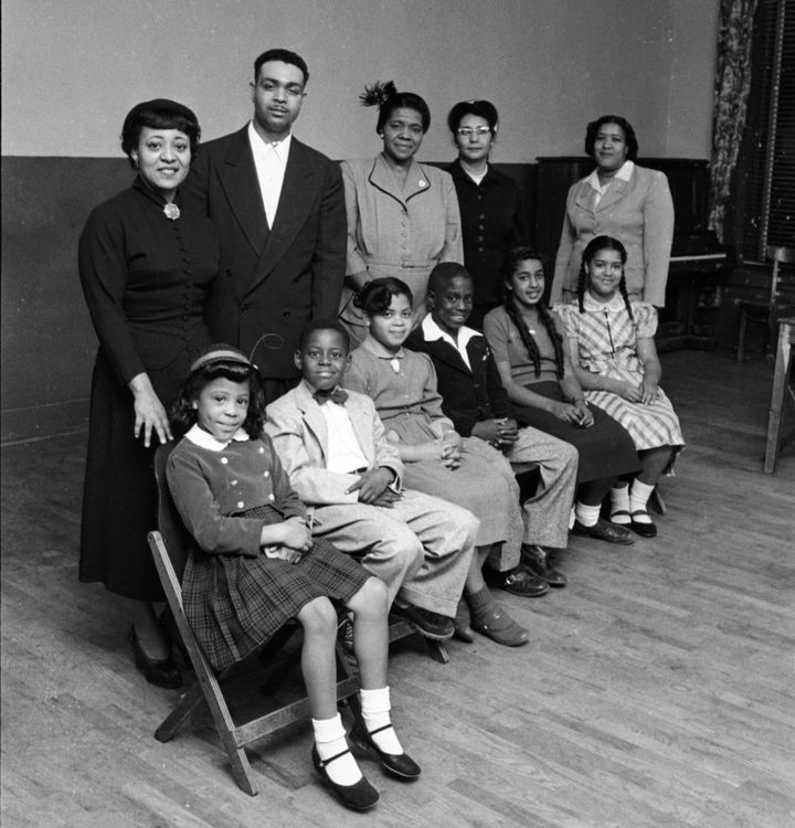 Portrait of the Black students and their parents who initiated Brown v. Board in Topeka, Kansas, 1953. Pictured are, front row from left, students Vicki Henderson, Donald Henderson, Linda Brown (for whom the suit was named), James Emanuel, Nancy Todd and Katherine Carper; back row from left, parents Zelma Henderson, Oliver Brown, Sadie Emanuel, Lucinda Todd and Lena Carper.