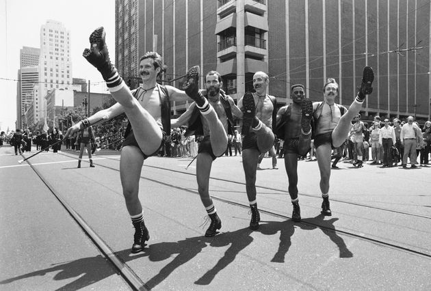 Members of the San Francisco Gay Freedom Day Marching Band and Twirling Corps dance down San Francisco's Market Street on June 27, 1982.