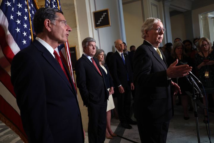 Senate Minority Leader Mitch McConnell (R-Ky.), joined by fellow Senate Republicans, speaking Tuesday. He has said GOP senators are "undecided" on forming a commission to investigate the Capitol riot earlier this year. 
